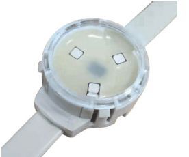 A close-up of a white LED pixel light with three embedded LEDs, on a white cable.