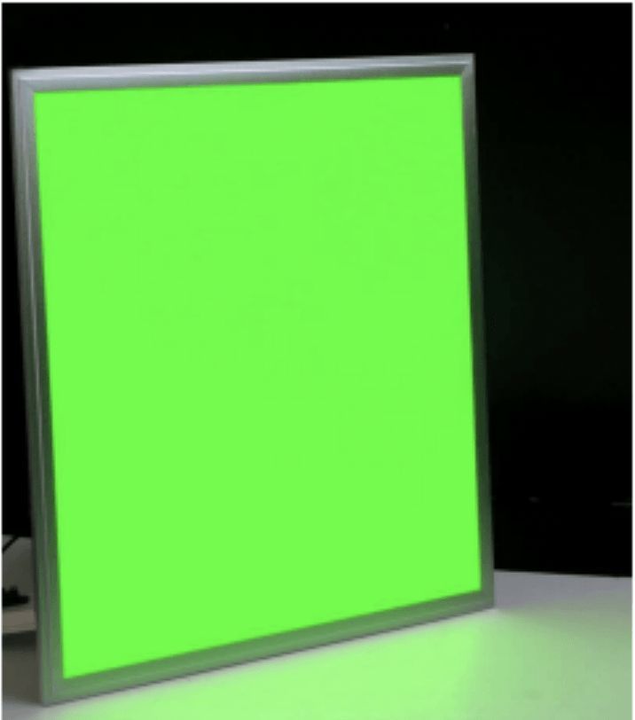 Green light panel with silver frame, emitting bright light.
