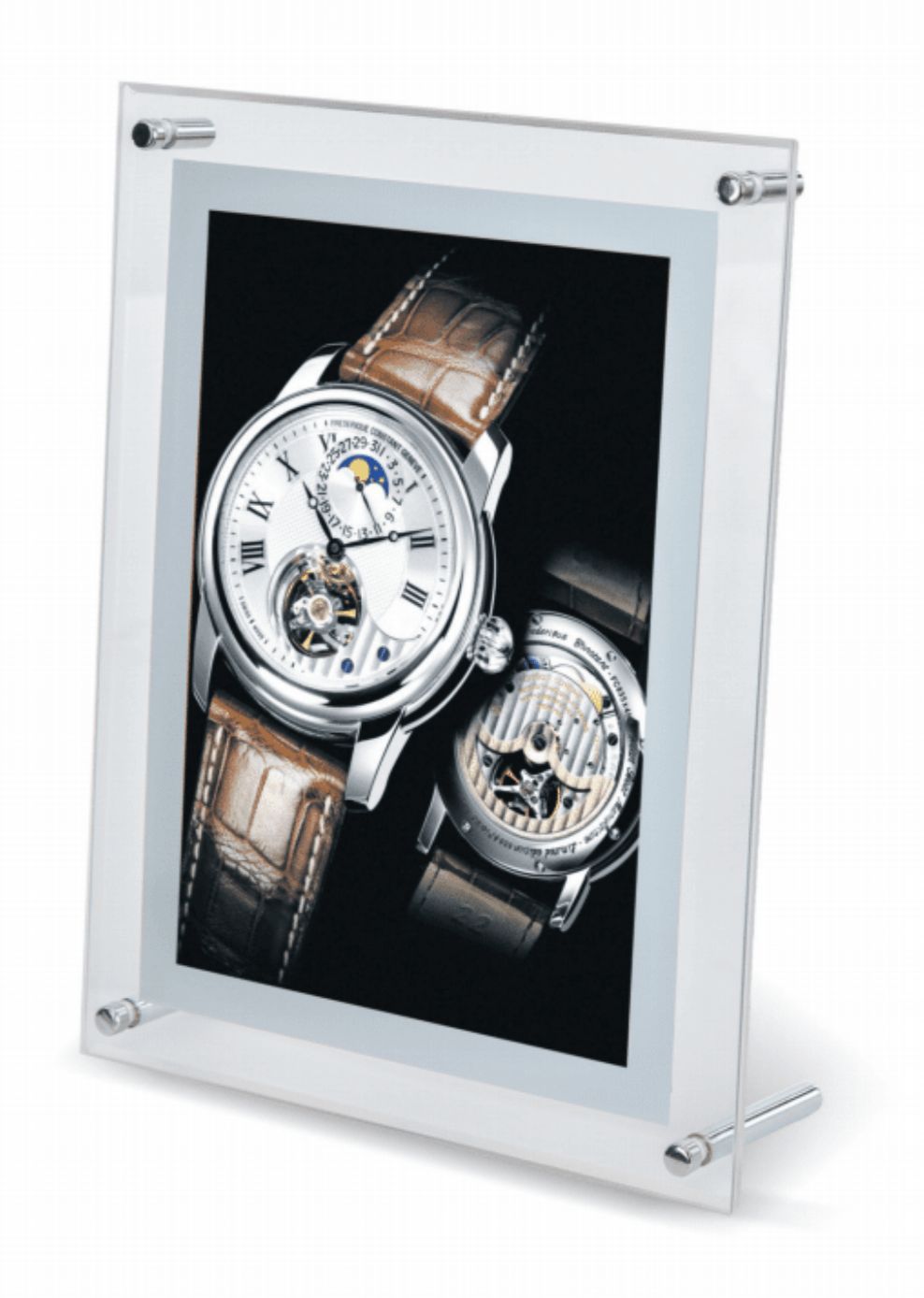Luxury watch displayed in a clear acrylic frame. Close-up of watch face and back with leather band on black background.