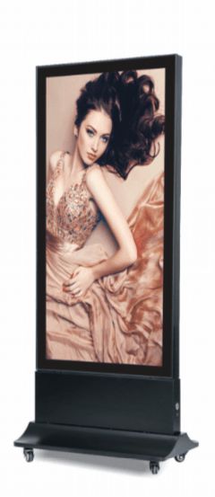 A tall black digital display featuring a woman in an elegant dress, set on a wheeled base.