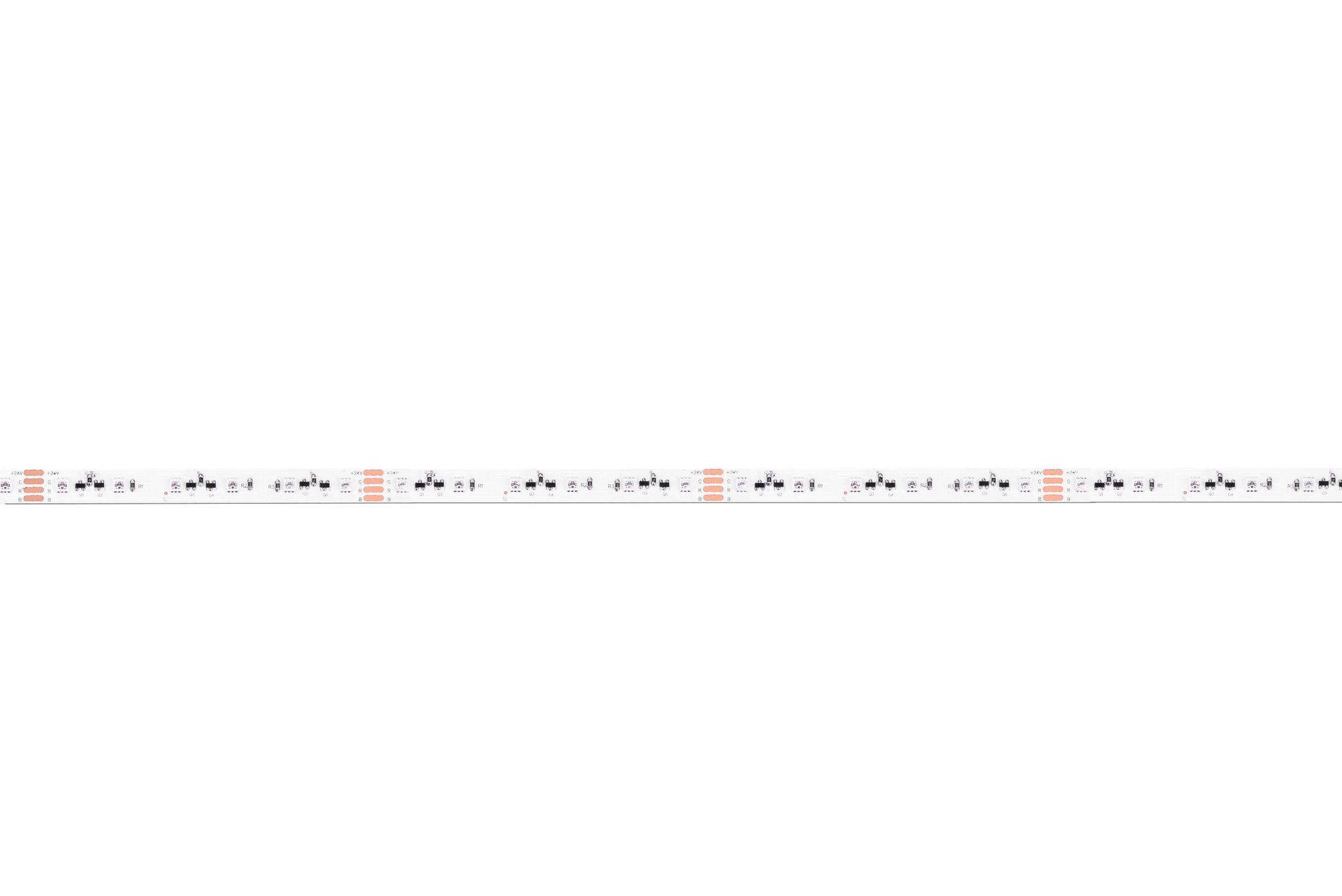 LED light strip with adhesive backing, coiled on a white surface.