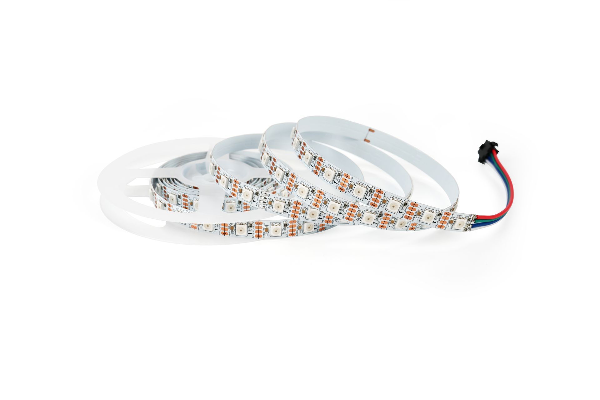 LED light strip coiled, with red, blue, and black wires attached, against a white background.