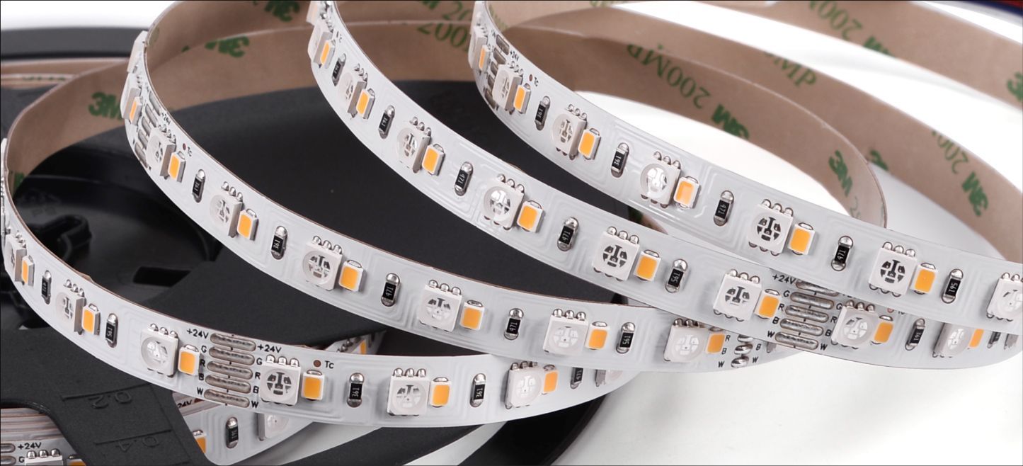 LED light strip coiled, with adhesive backing visible.