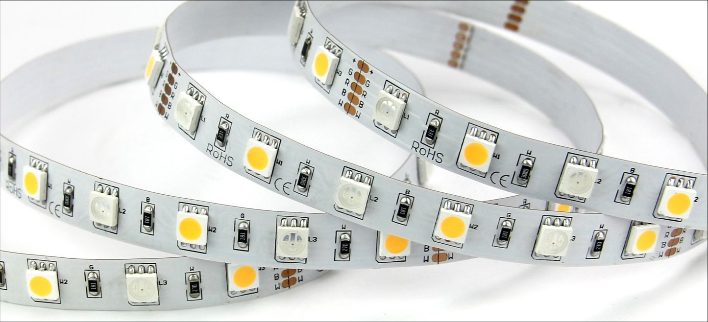 Flexible LED strip lights coiled on a white background. Alternating warm and cool white LEDs are visible.