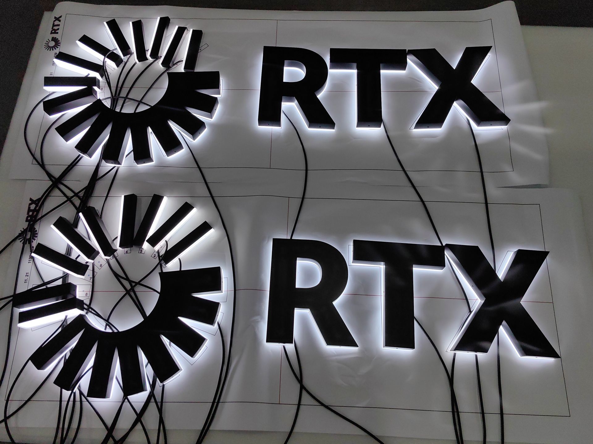 RTX Logo and Sign