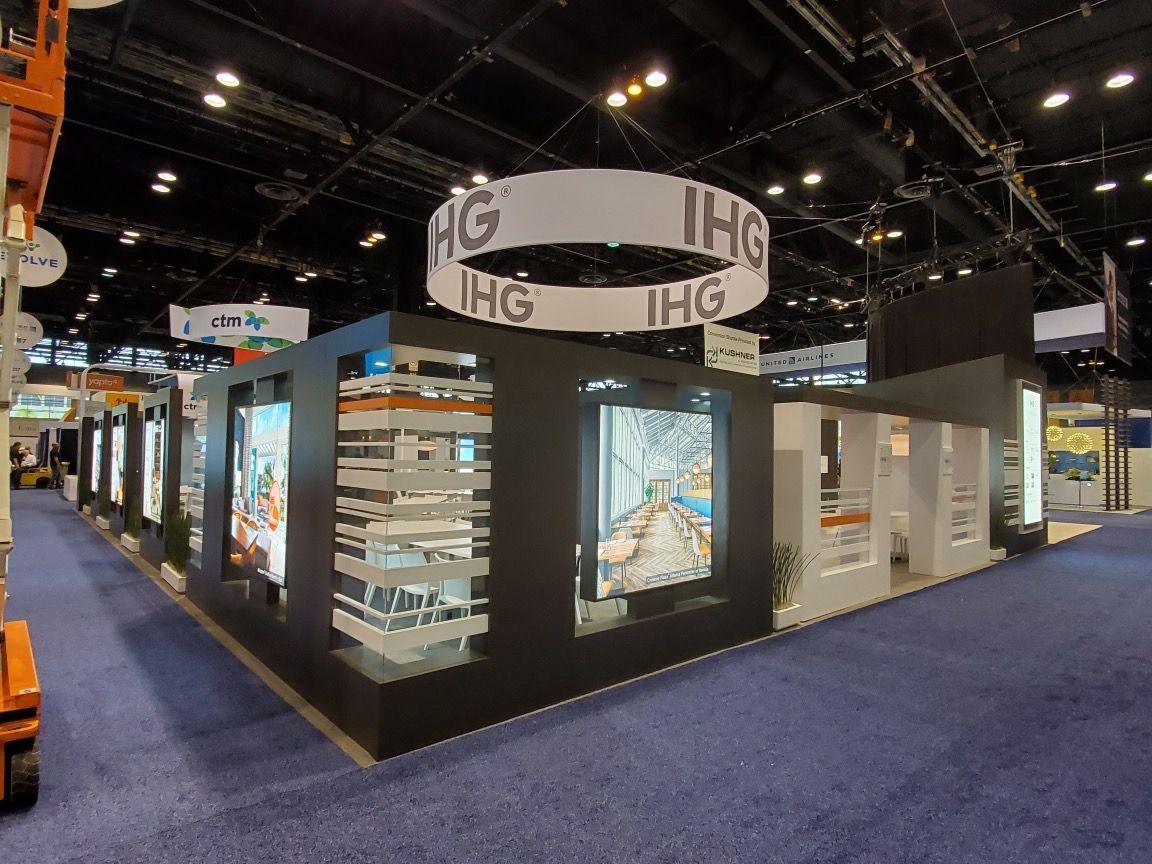 A large room with a sign that says ' IHG ' on it