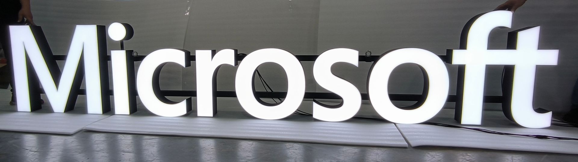 A white sign that says microsoft on it