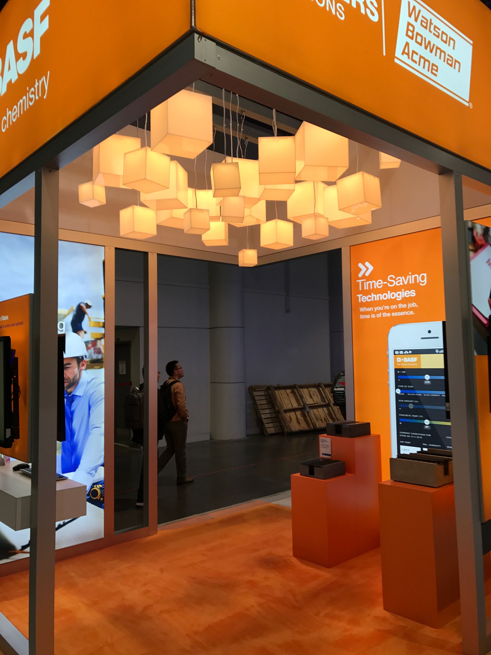 A large orange building with a LED sign