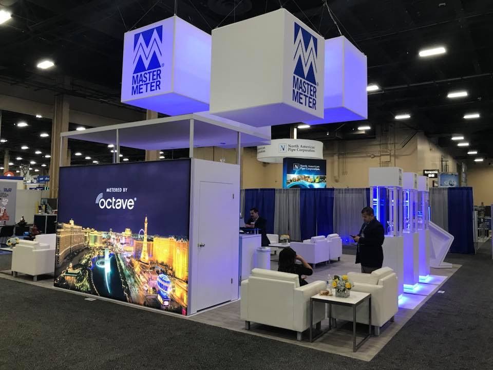 A large booth with a large sign that says water meter