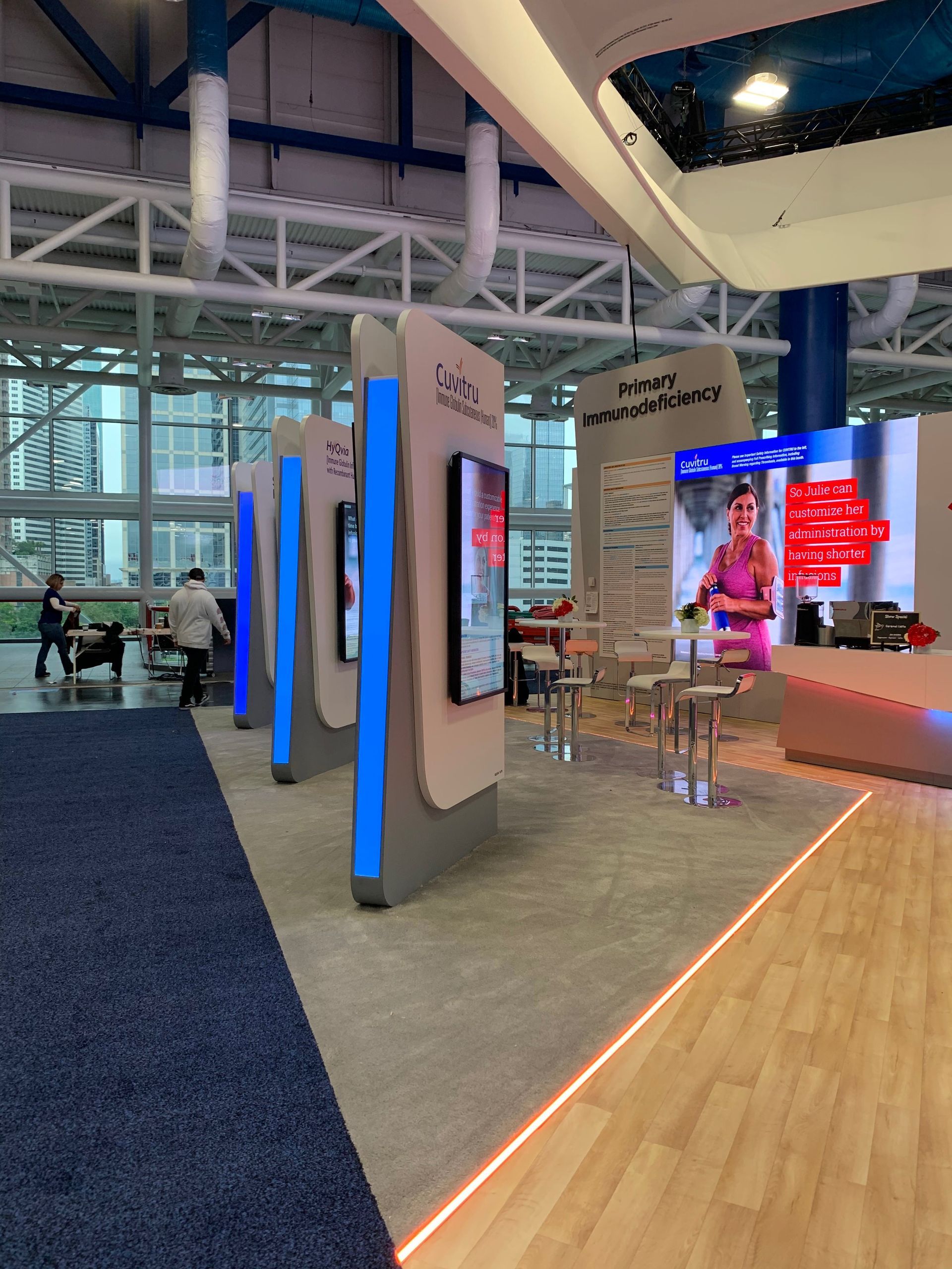 A large room with a lot of displays and tables