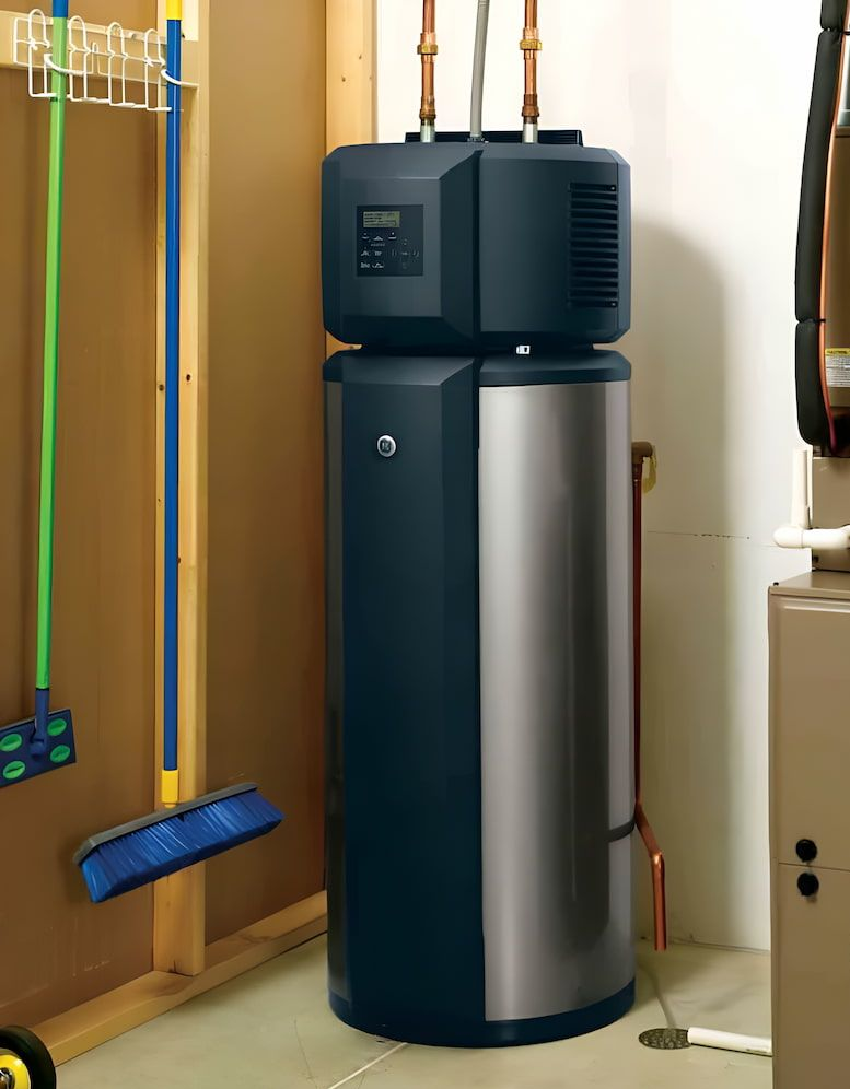 Heat Pump Water Heater in a Utility Room Next to a Furnace — Corrimal Plumbing Services in Thirroul, NSW