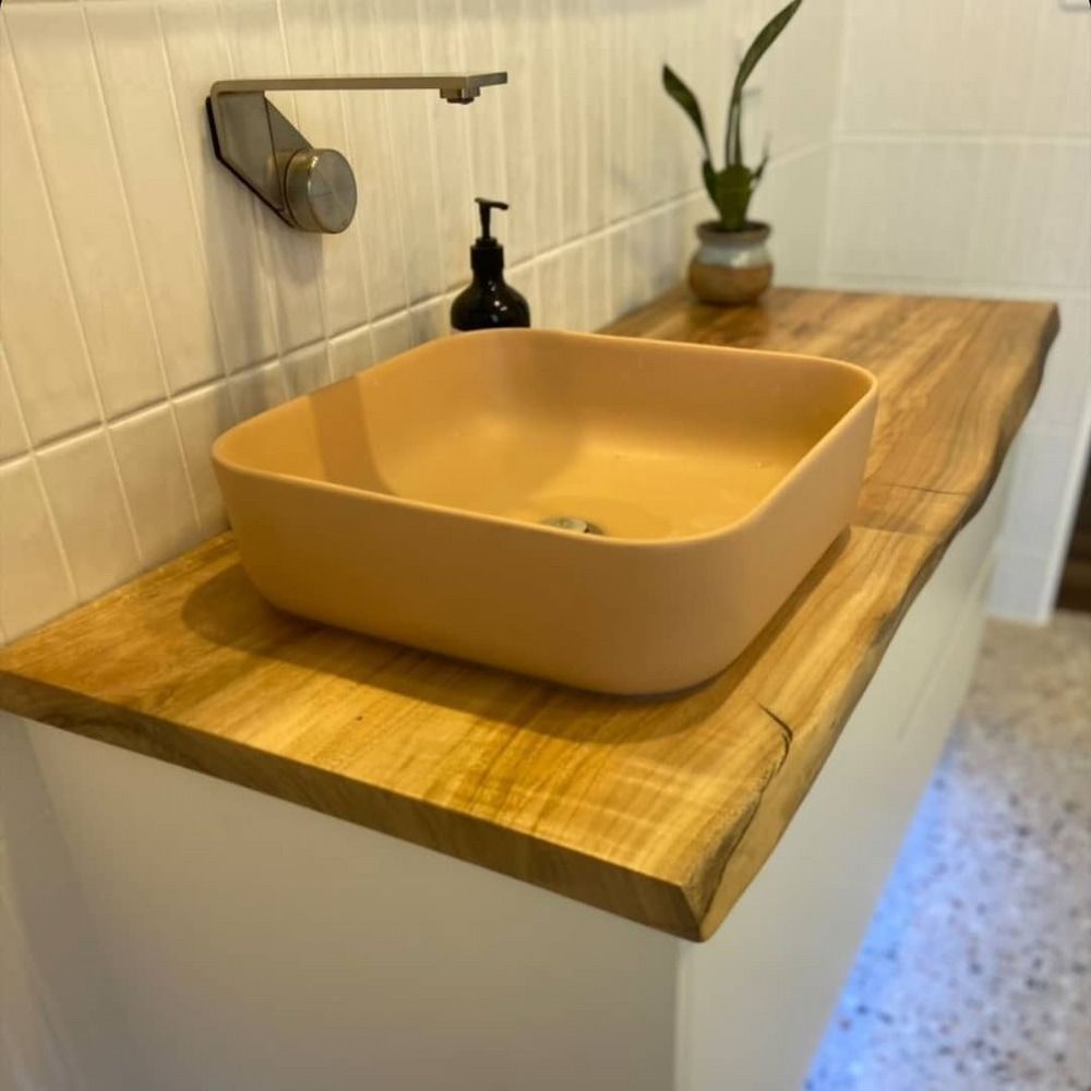 Bathroom Vanity With a Wood Countertop and Beige Square Sink — Corrimal Plumbing Services in East Corrimal, NSW