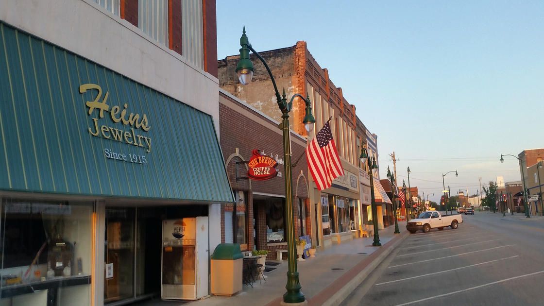 A jewelry store is located on the corner of a street