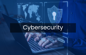 A person is typing on a laptop computer in front of a screen that says cybersecurity.