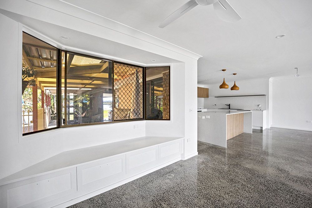 There Is A Large Window In The Middle Of The Room — Green e Building in Lennox Head, NSW