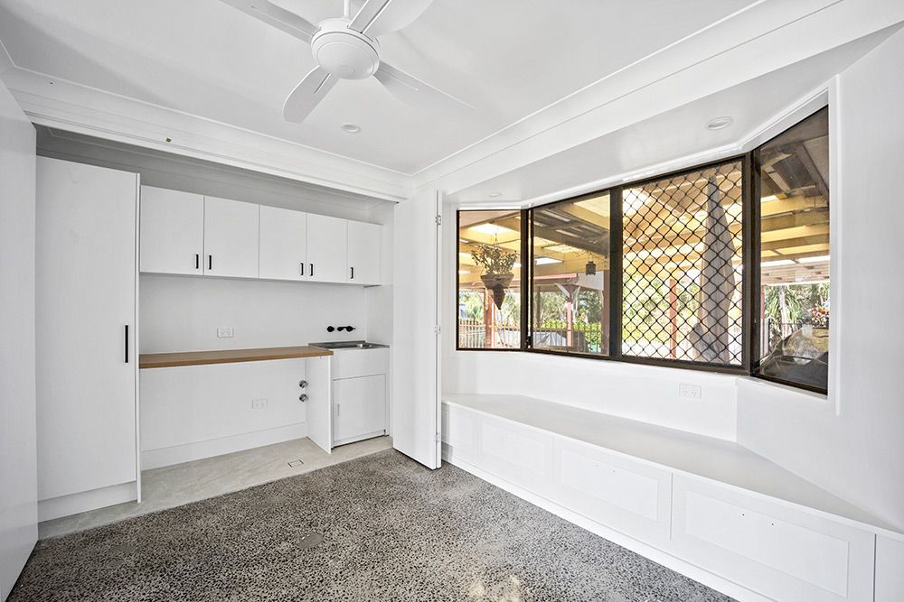 An Empty Room With A Ceiling Fan And A Large Window — Green e Building in Lennox Head, NSW
