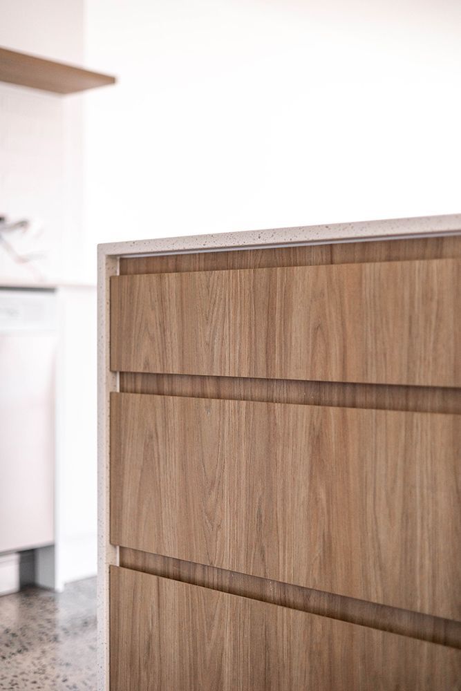 A Close Up Of A Wooden Dresser In A Kitchen — Green e Building in Byron Bay, NSW