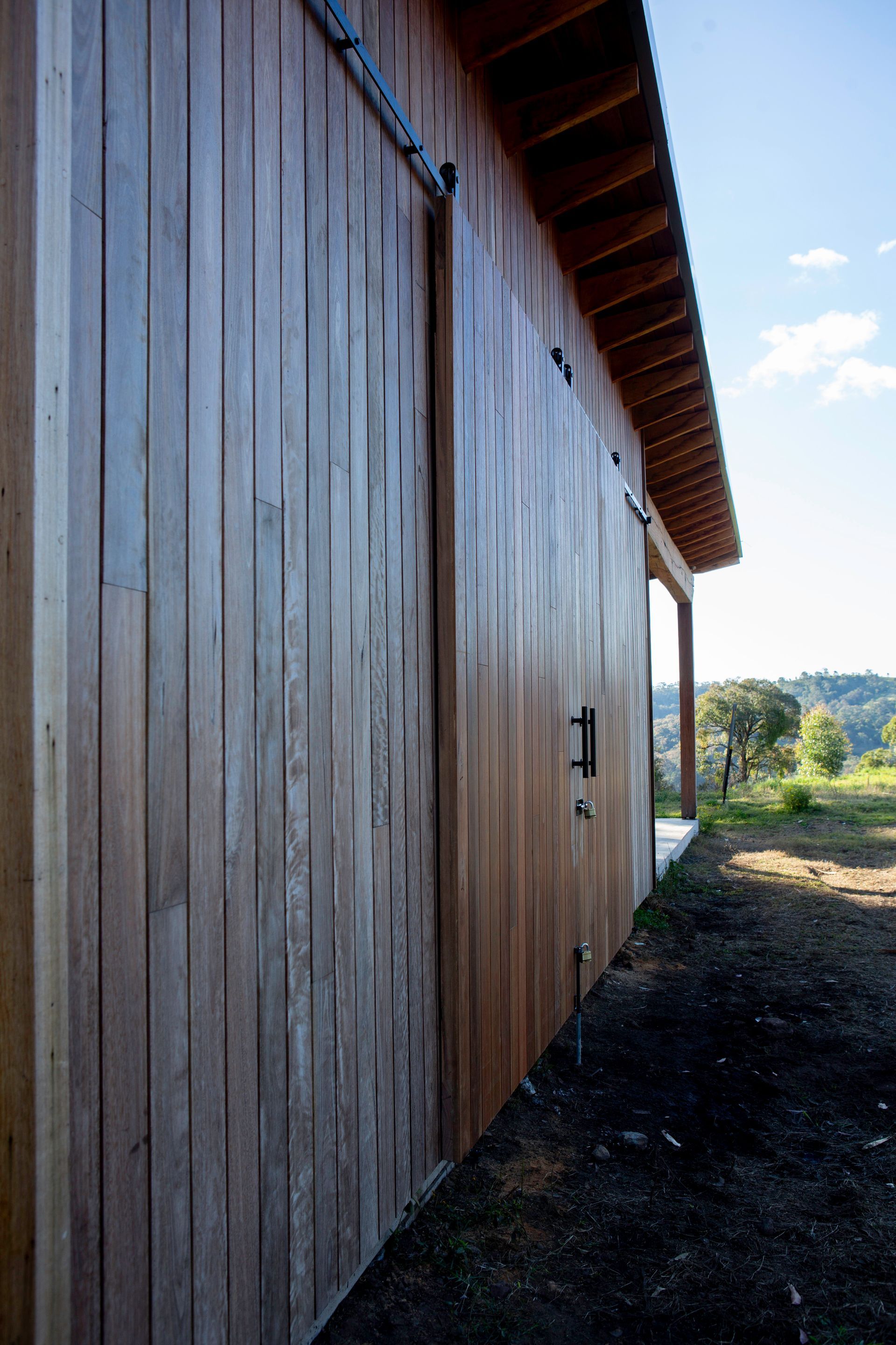 An Artist 's Impression Of A House With A Covered Patio And A Pool — Green e Building in Lennox Head, NSW