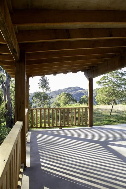 An Empty Walk In Closet With White Shelves And A Window — Green e Building in Lennox Head, NSW