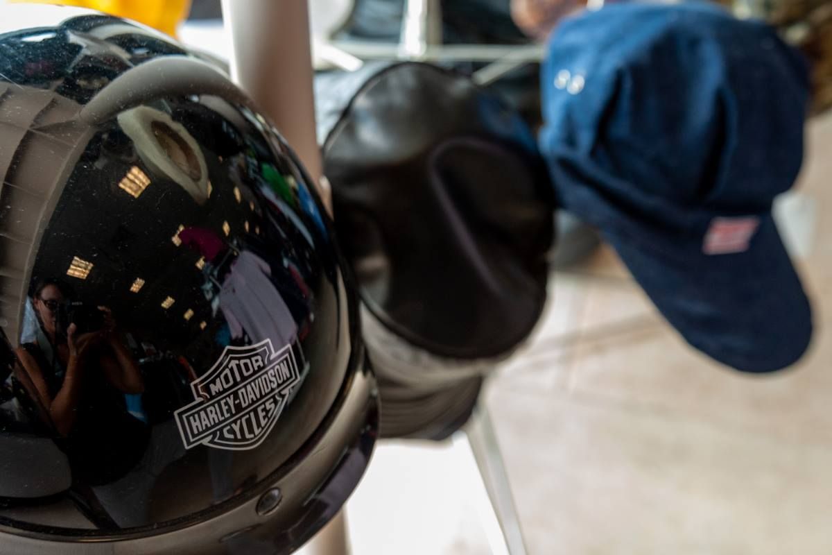 A store filled with lots of clothes and boots.