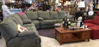A living room filled with furniture and a coffee table.