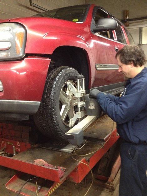 ASE Certified Technician — Mechanic Doing Wheel measurement In Blackstone, MA