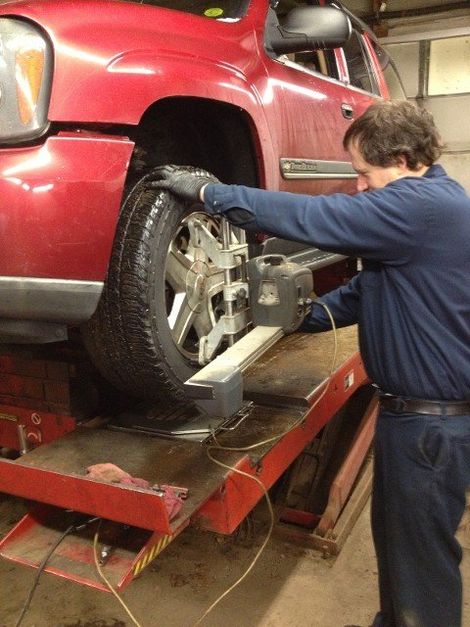 Mechanic — Mechanic Doing Wheel Alignment In Blackstone, MA