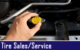 Tire Sales — Mechanic With His hand On The Engine In Blackstone, MA