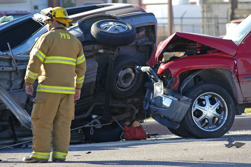 a fireman responding at a car accident
