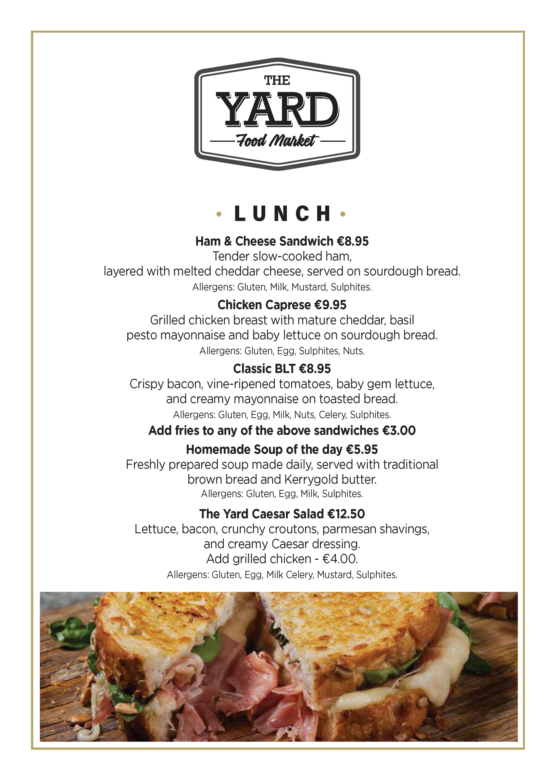 The Yard Food Market lunch menu with sandwich image. Offers include sandwiches, soup, and salad.