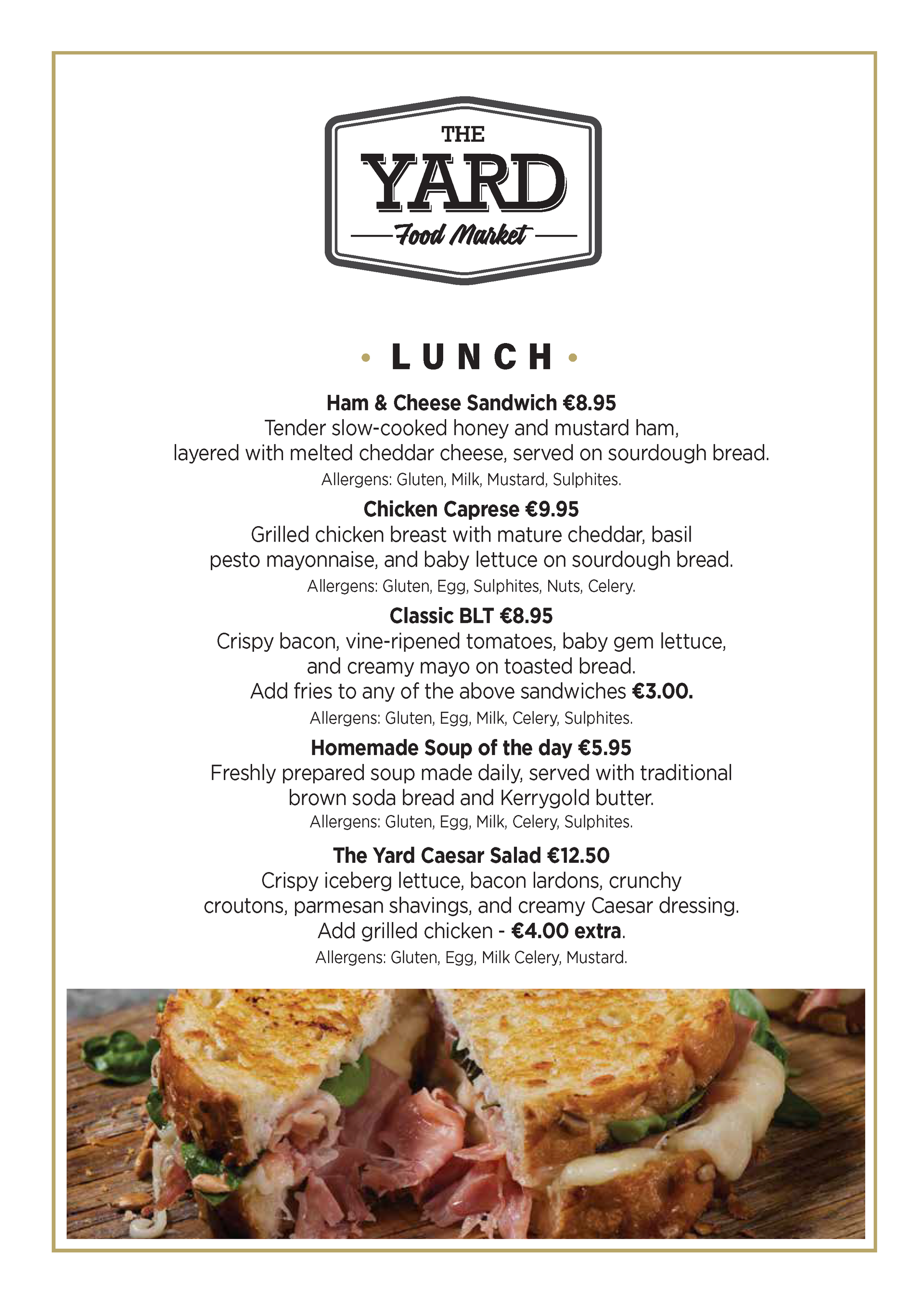 The Yard Food Market lunch menu with sandwich image. Offers include sandwiches, soup, and salad.
