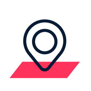 A map pin is sitting on top of a red square.