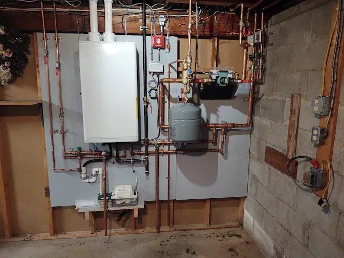 Residential boiler system in basement