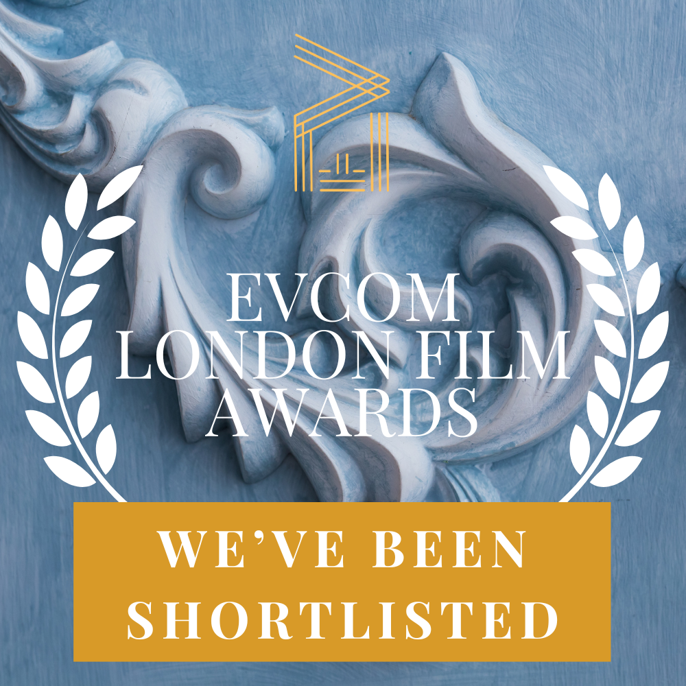 A sign that says evcom london film awards we 've been shortlisted