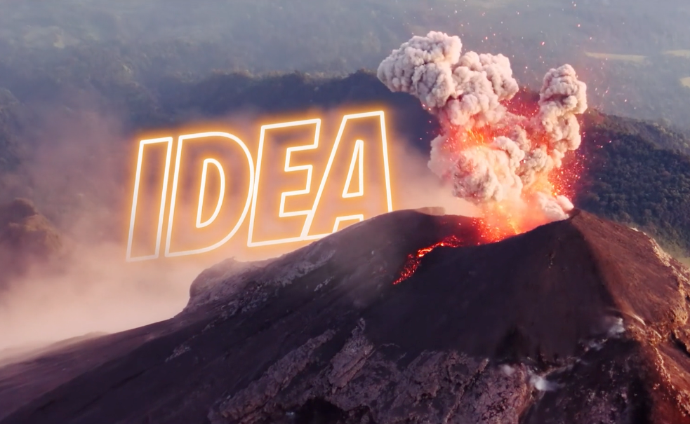A volcano erupting with the word idea above it