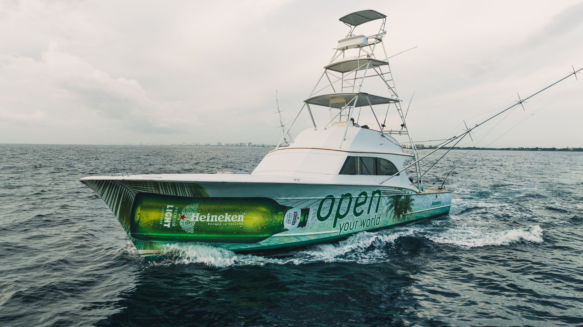 A boat with the word open on the side of it