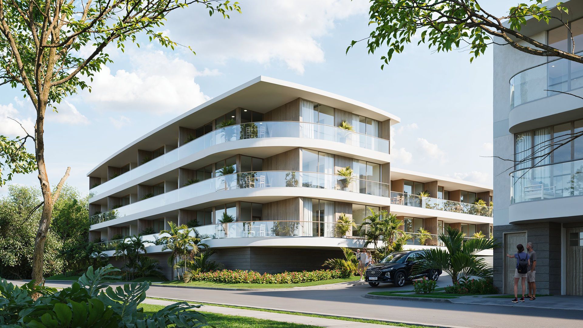 Modern apartment building with curved balconies, car parked, and people walking on the side.