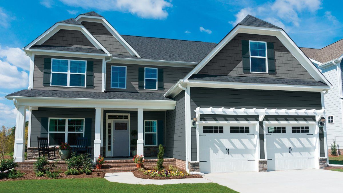 Modern vinyl siding home in Central Illinois and St Louis area showing clean exterior and updated siding.