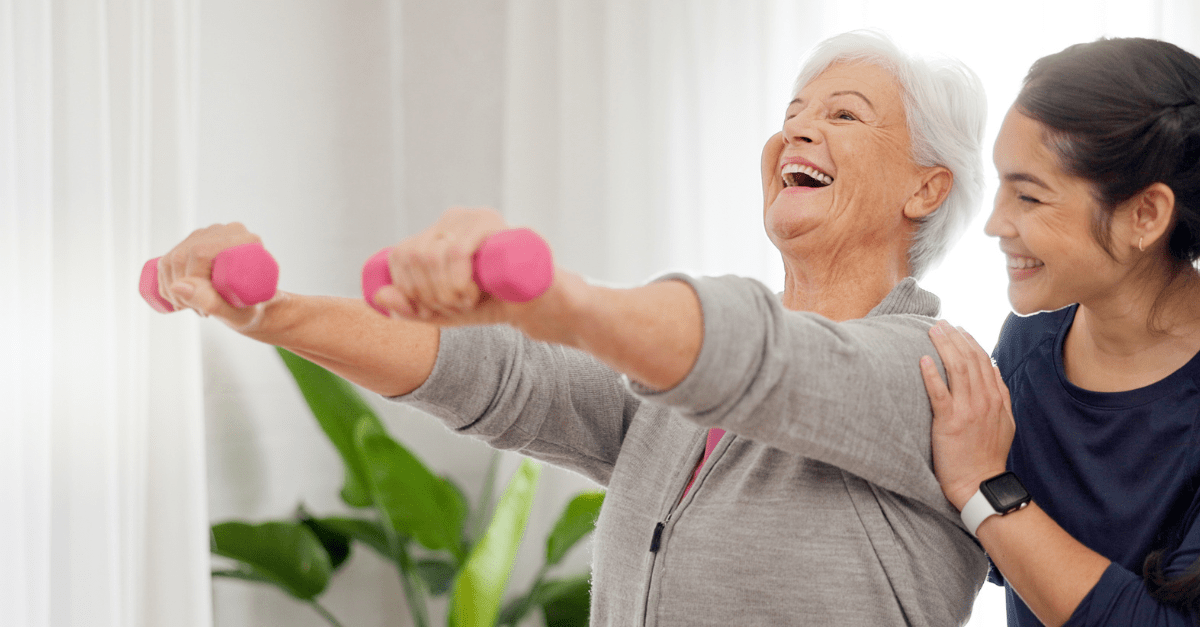 older lady during her physiotherapy session with a physiotherapist