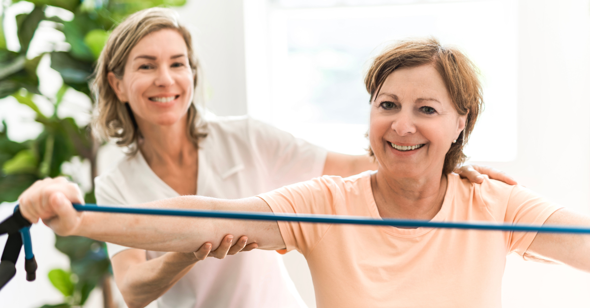 healthcare professional helping a woman manage her pain through physiotherapy exercises