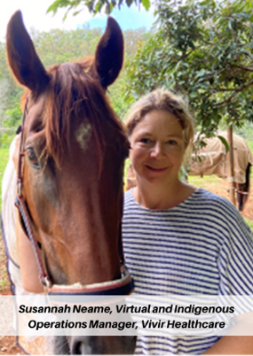 Susannah neame is standing next to a brown horse