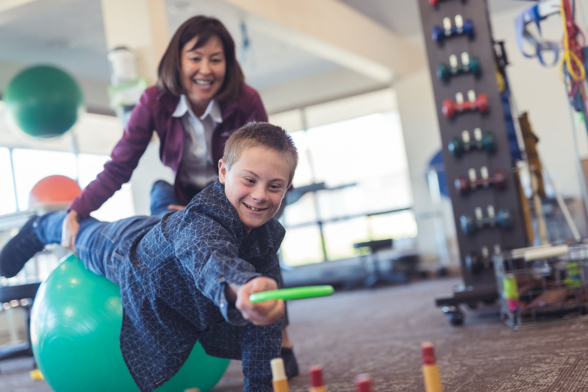 Occupational Therapist with an child at their Occupational Therapy session