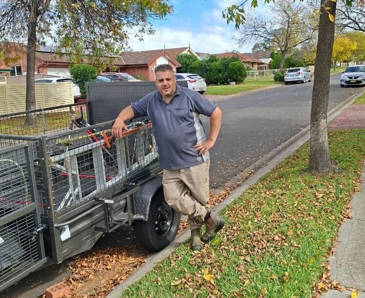 Mowbuddy Lorenzo standing outside his trailer