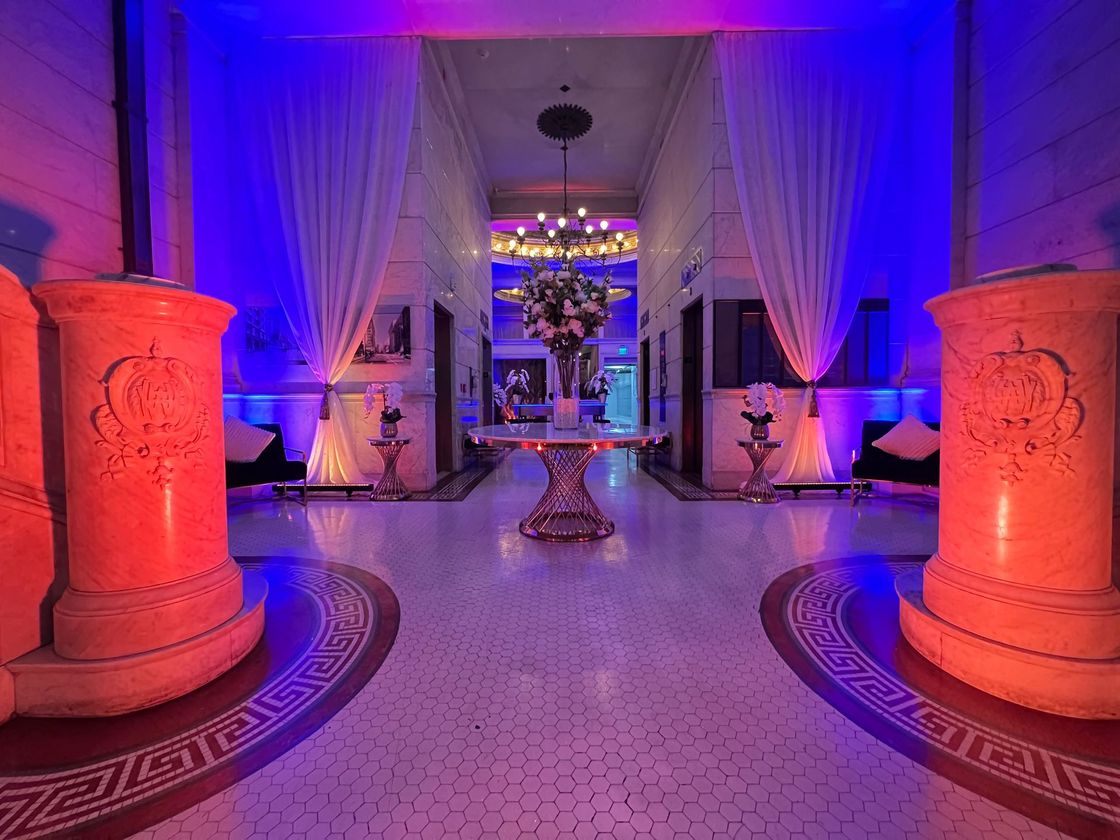 Lobby entrance with red lighting at HWH Luxury Living in DTLA