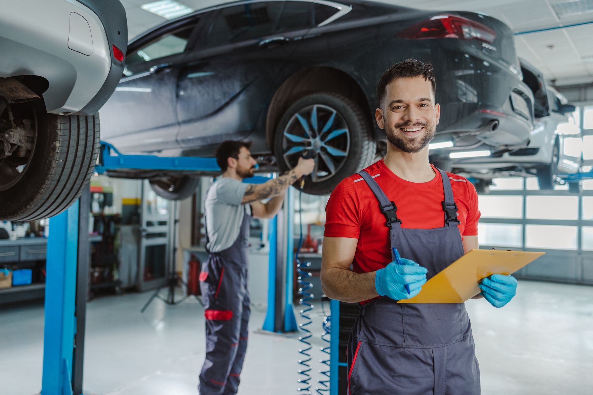 An automotive technician at auto service centre