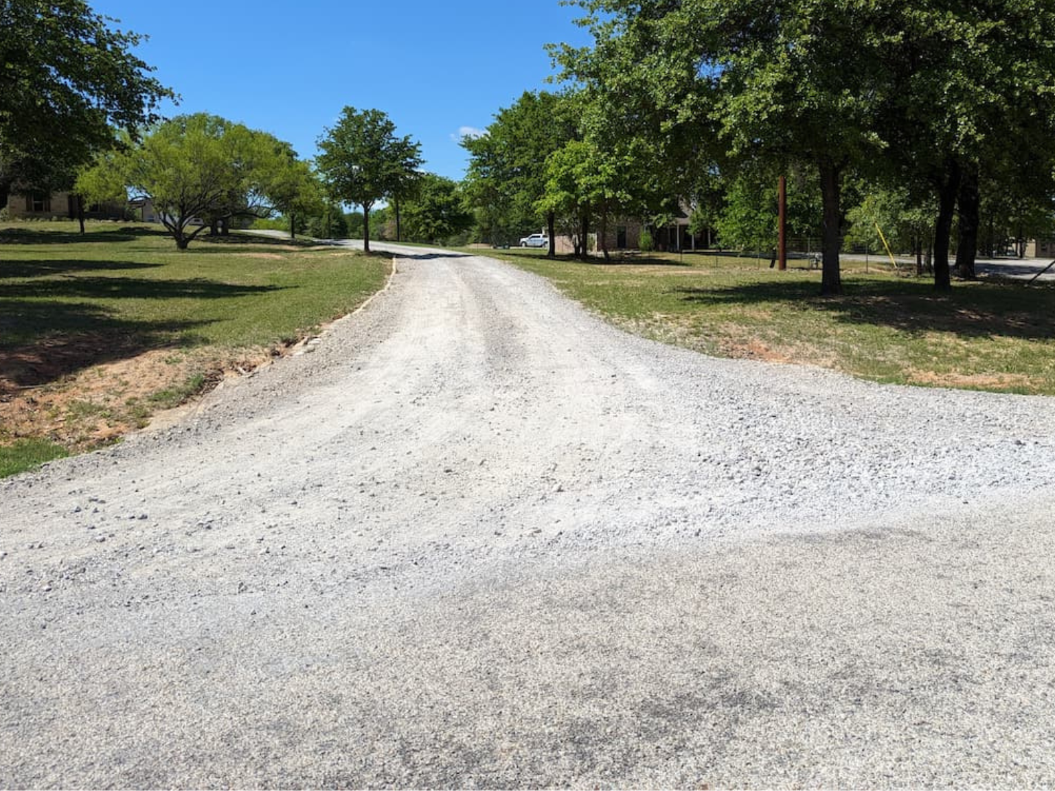 A long caliche driveway in River Park, FL.