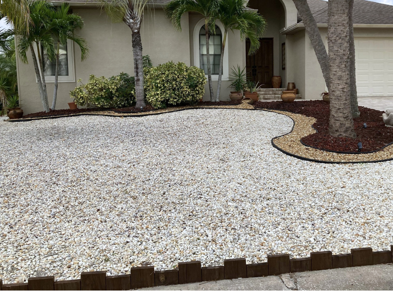 Gravel landscaping and a gravel driveway near Port St. Lucie, FL.