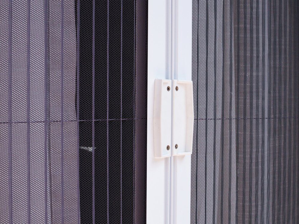 Door Frame With Mosquito Wire Screen of Home — Custom Window Furnishings in Wagga Wagga, NSW