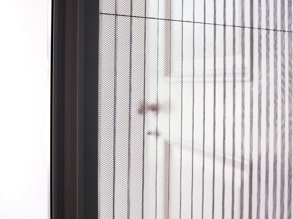 Door Frame With Mosquito Wire Screen — Custom Window Furnishings in Wagga Wagga, NSW