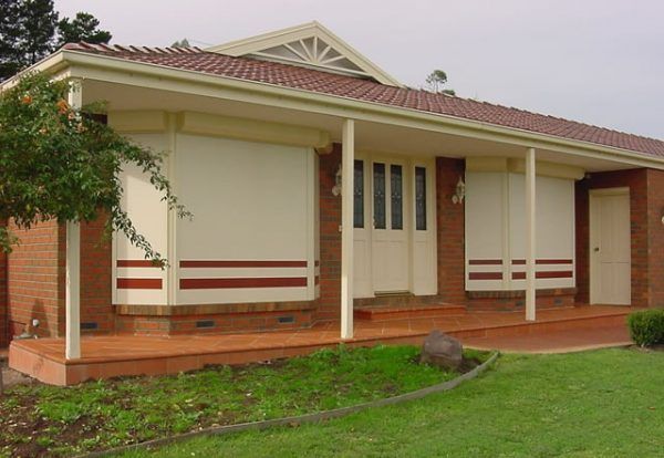 Row of Grey Industrial Units With Roller Shutter Doors — Custom Window Furnishings in Wagga Wagga, NSW